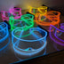 Collection of multicolored rainbow LED transparent cyber glasses - Bulk ordering option of illuminated futuristic eyewear for corporate events, LGBTQIA+ pride parades, tech conventions, and group costumes