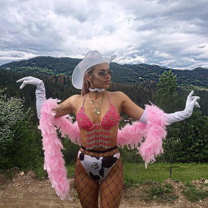 White LED neon cowgirl hat glowing for corporate event planning company celebrations and western themed party outfits