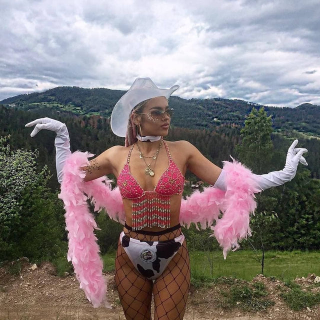 White LED neon cowgirl hat glowing for corporate event planning company celebrations and western themed party outfits