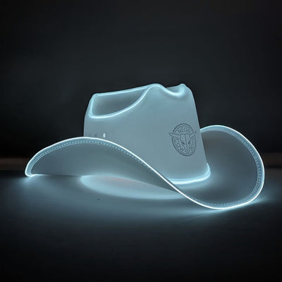 White cowboy hat with bright LED lights perfect for barn wedding receptions ranch themed celebrations and western bridal parties