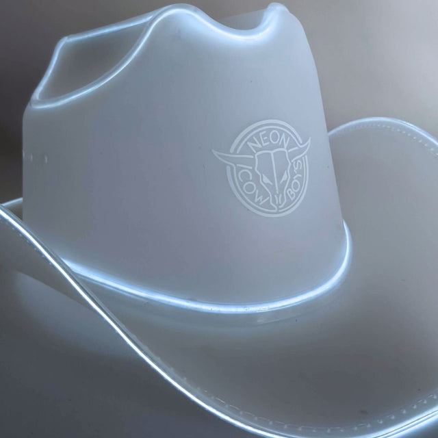 White LED space cowgirl hat glowing bright for luxury birthday celebrations high end parties and western costume fashion outfits
