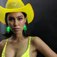Yellow cowboy hat with bright LED lights glowing in multiple colors for western party planning and costume fashion celebrations