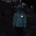 Close-up of glowing blue animated horse illuminating on men's jacket perfect for motorcycle night riding and futuristic space cowboy festival outfits